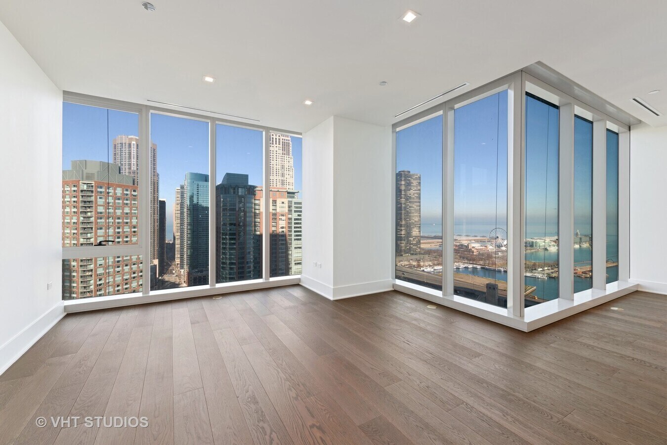 Undisclosed Address Chicago, IL 60601 - Photo 4 of 21 a view of an empty room with wooden floor and a window