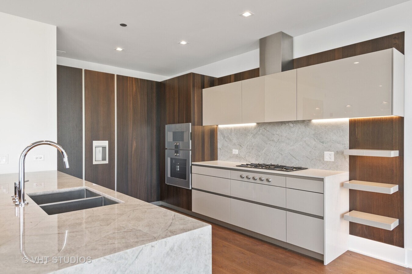 Undisclosed Address Chicago, IL 60601 - Photo 7 of 21 a kitchen with granite countertop a stove a sink and a refrigerator