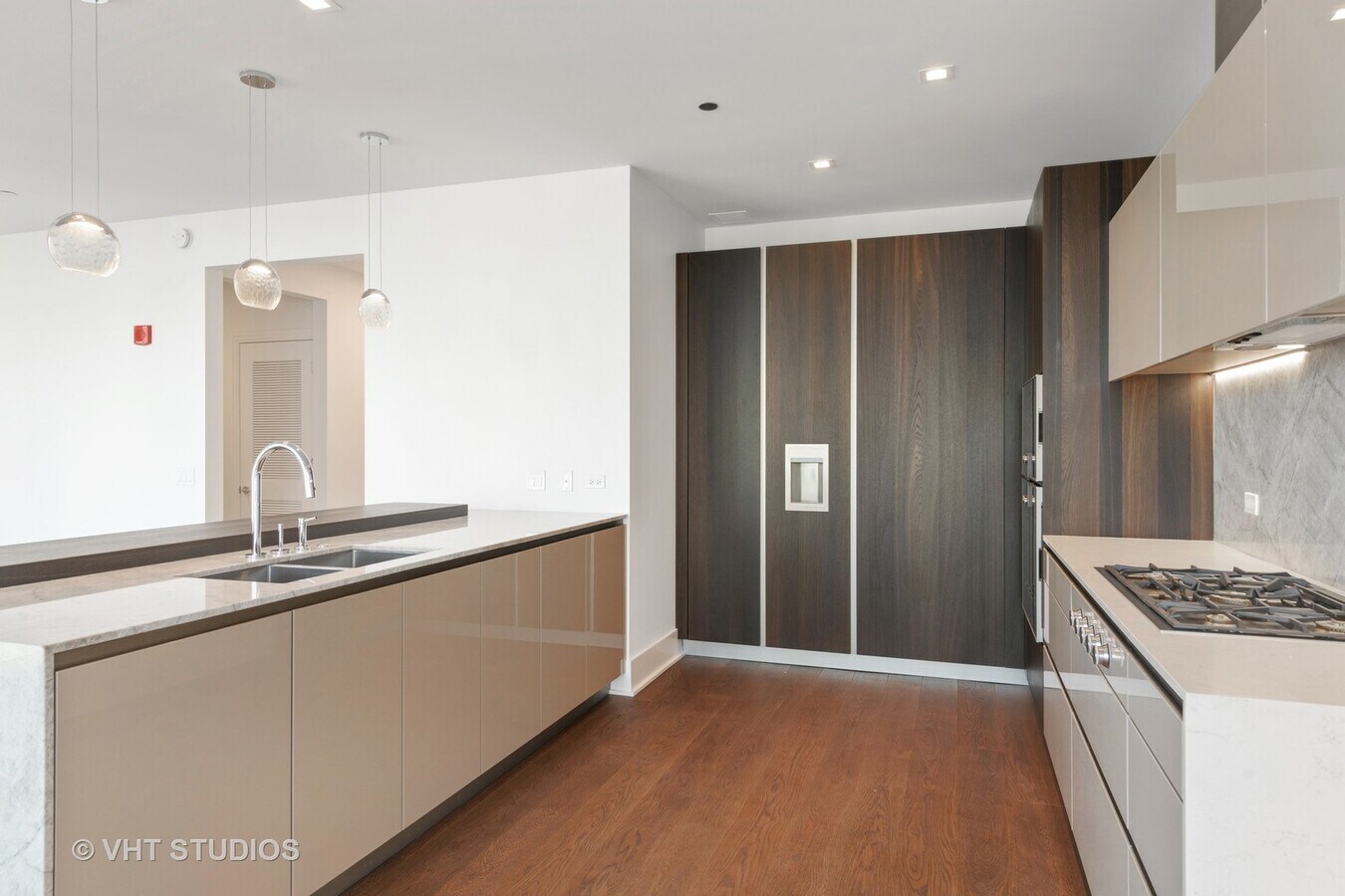 Undisclosed Address Chicago, IL 60601 - Photo 8 of 21 a kitchen with stainless steel appliances granite countertop a sink and a refrigerator