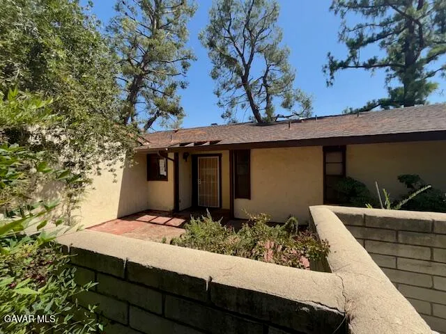 a view of house with outdoor space