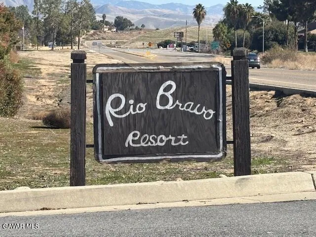 a sign broad on the side of the road