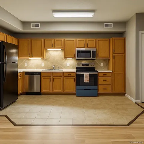 a view of a hallway with wooden floor and closet