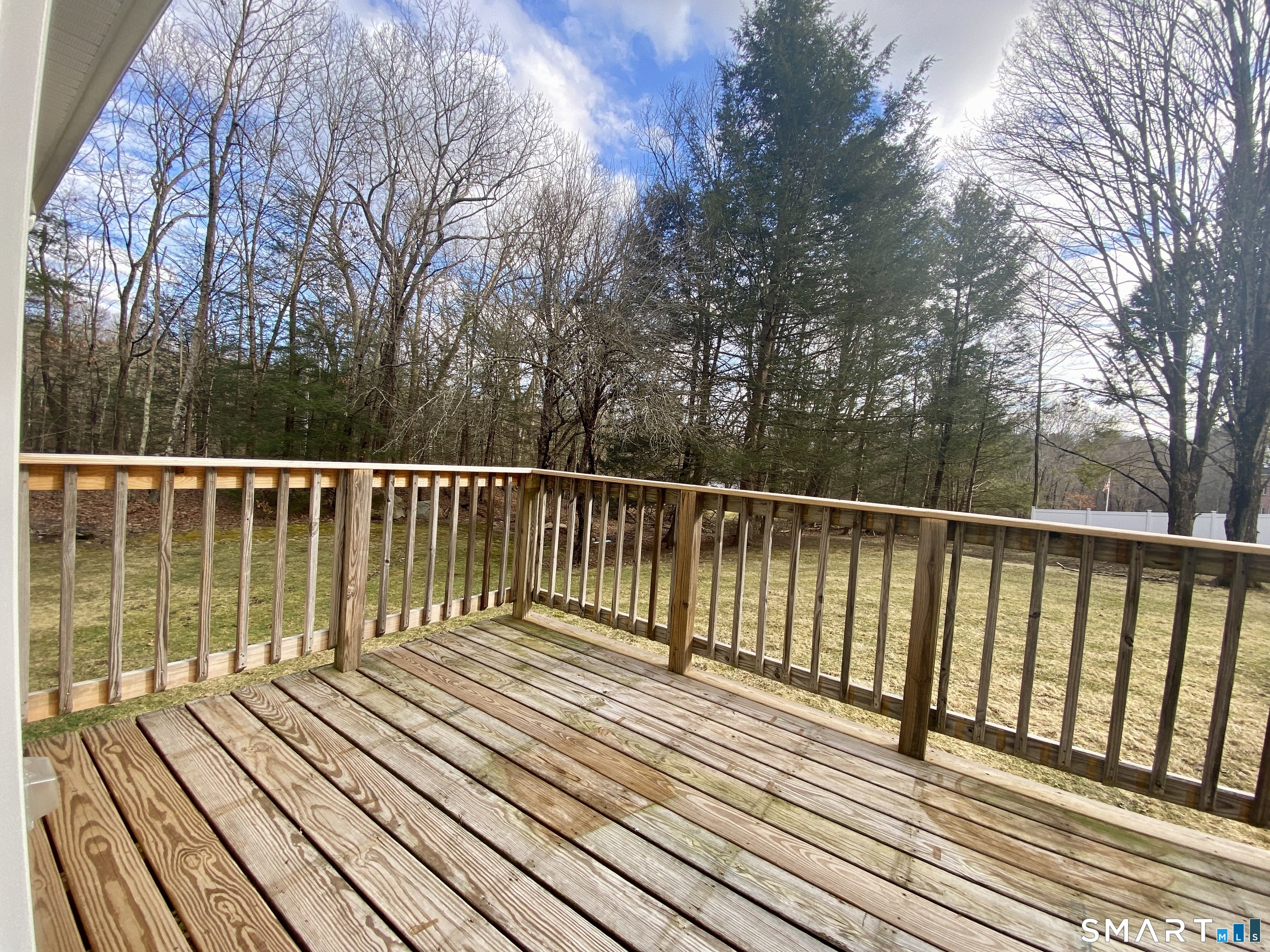 185 Whitbeck Road New Hartford, CT 06057 - Photo 11 of 18 a view of balcony with wooden floor and fence