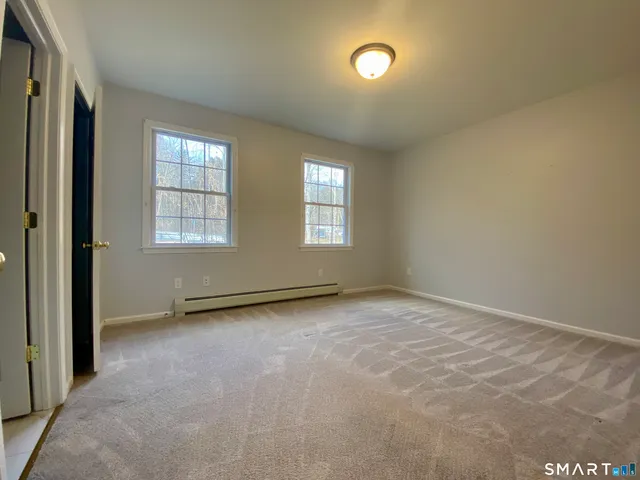 an empty room with windows