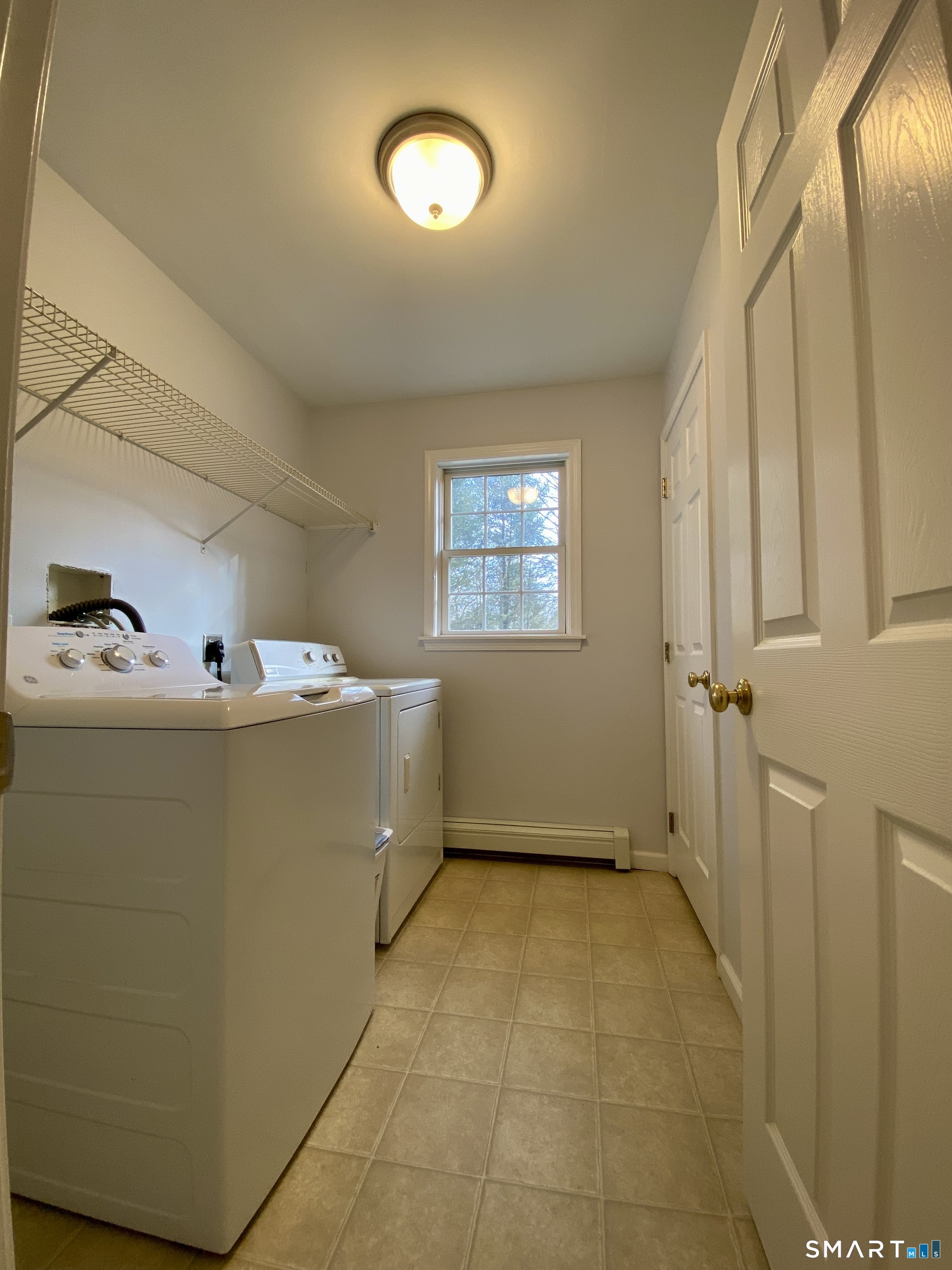 185 Whitbeck Road New Hartford, CT 06057 - Photo 9 of 18 a room with storage and utility