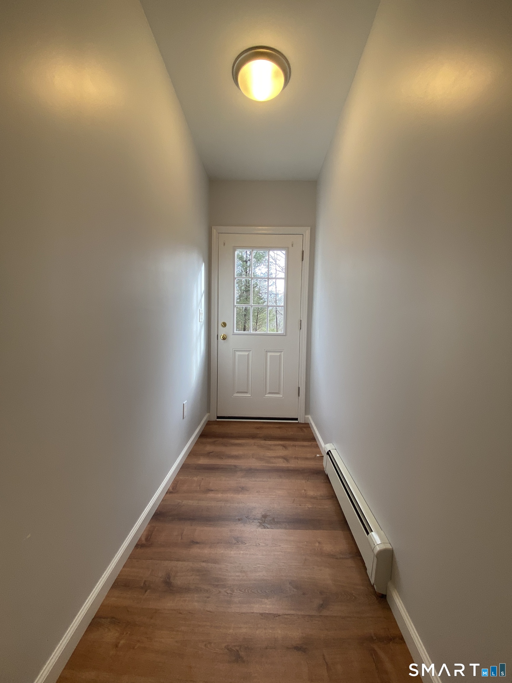 185 Whitbeck Road New Hartford, CT 06057 - Photo 10 of 18 an empty room with windows