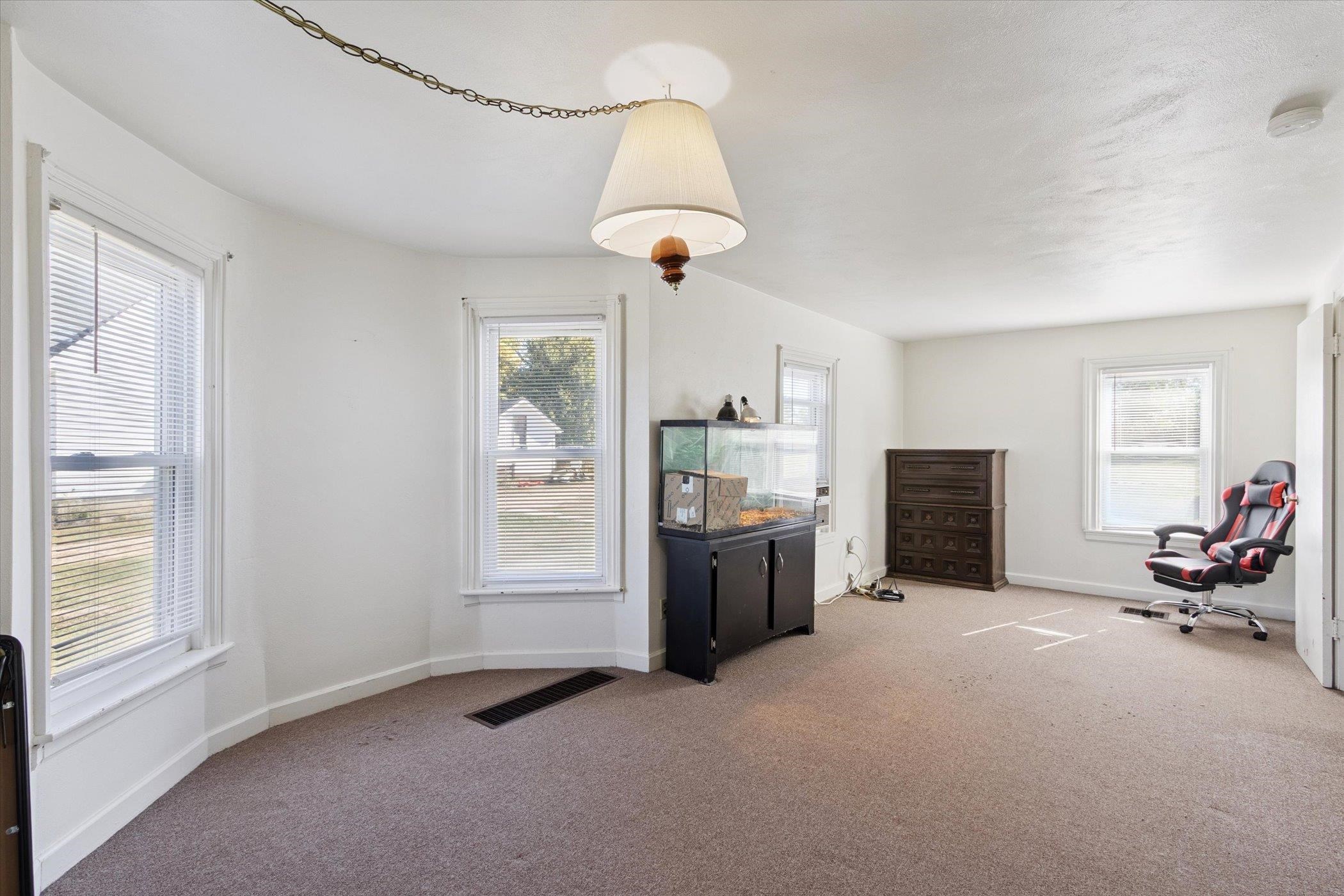 2683 West Florence Road Freeport, IL 61032 - Photo 16 of 36 a view of a livingroom with furniture and windows
