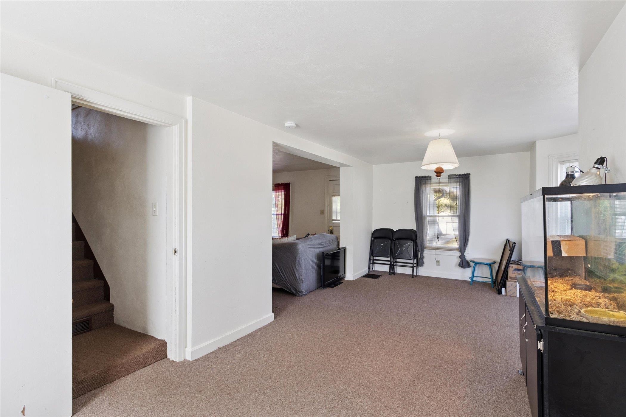 2683 West Florence Road Freeport, IL 61032 - Photo 19 of 36 a view of a livingroom with furniture and an empty room
