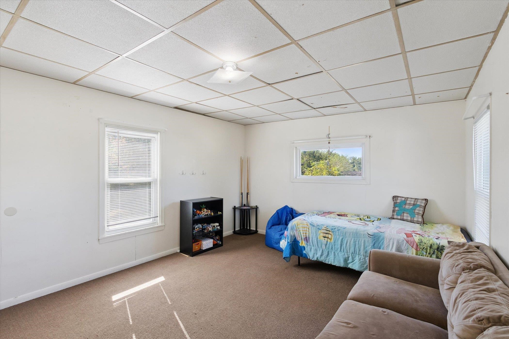 2683 West Florence Road Freeport, IL 61032 - Photo 23 of 36 a bedroom with furniture and a window