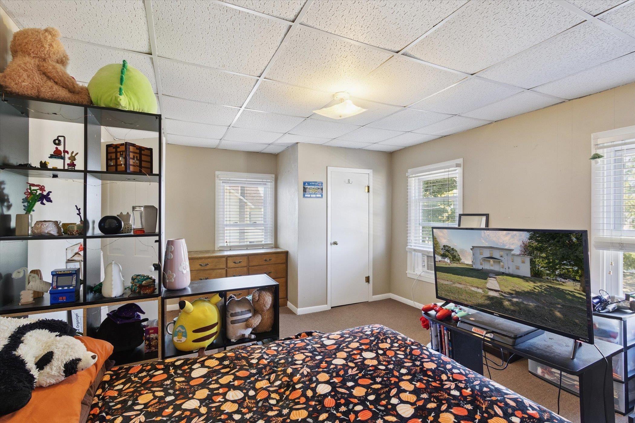 2683 West Florence Road Freeport, IL 61032 - Photo 30 of 36 a bedroom with furniture and a fireplace