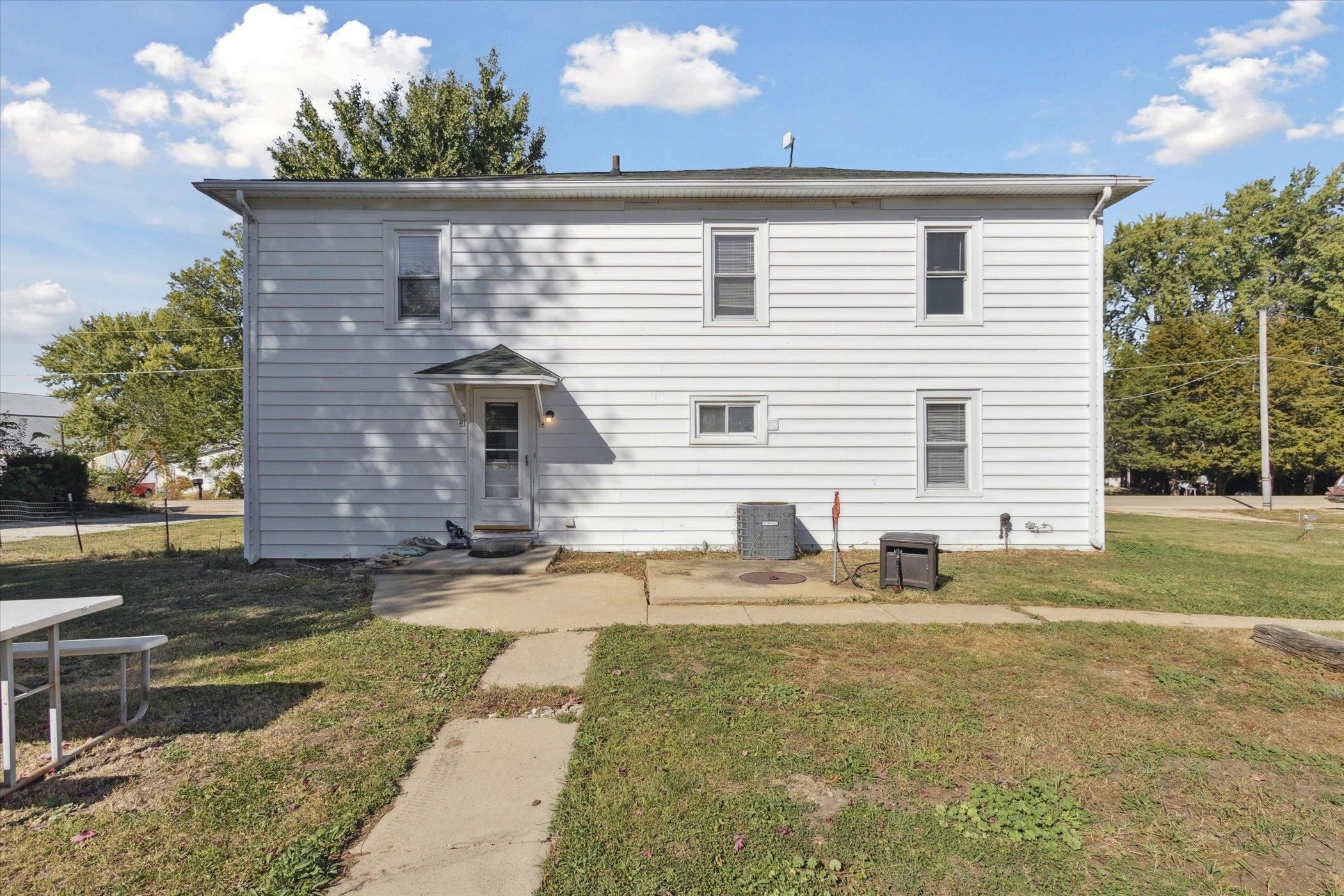 2683 West Florence Road Freeport, IL 61032 - Photo 32 of 36 a view of a house with a yard and sitting area
