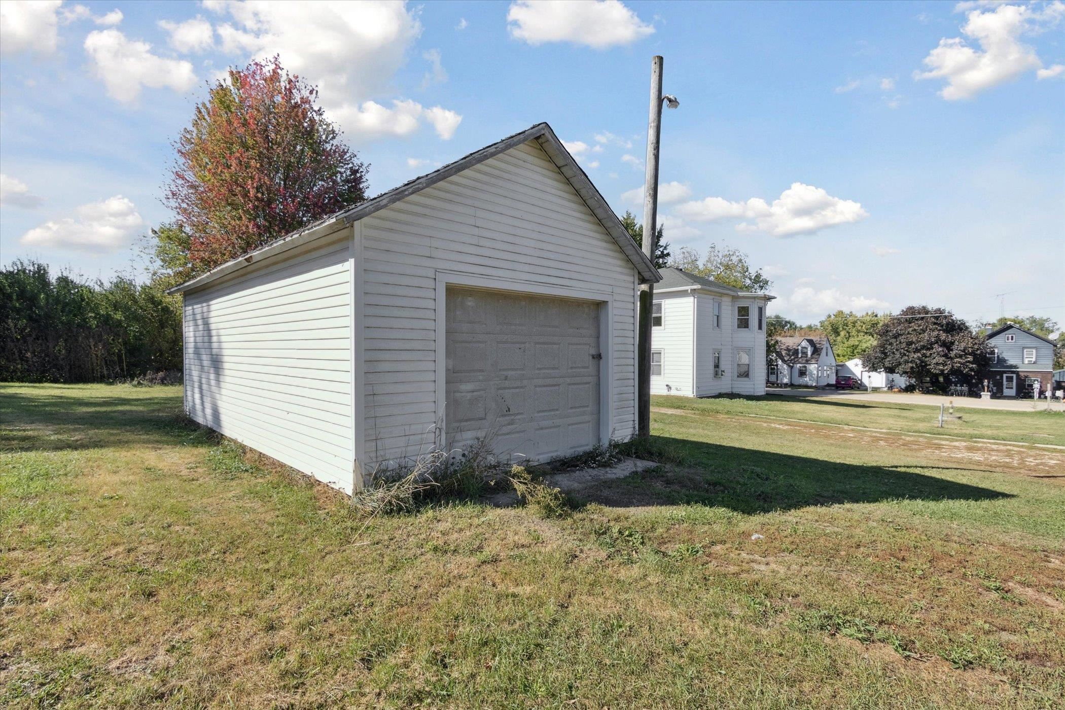 2683 West Florence Road Freeport, IL 61032 - Photo 34 of 36 a view of a house with a yard