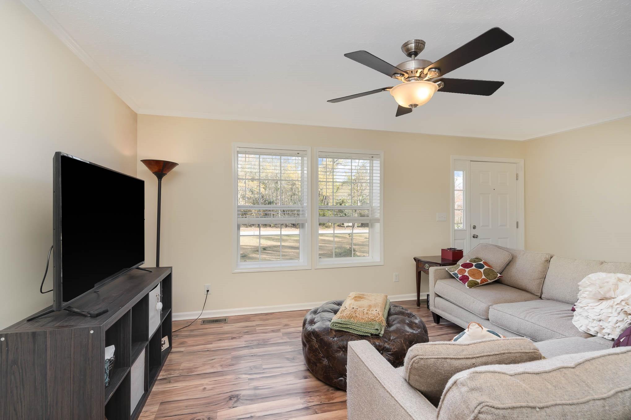 1811 Overbrook Road Kershaw, SC 29067 - Photo 8 of 32 a living room with furniture and a flat screen tv