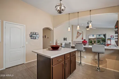 a kitchen with a counter space and a table