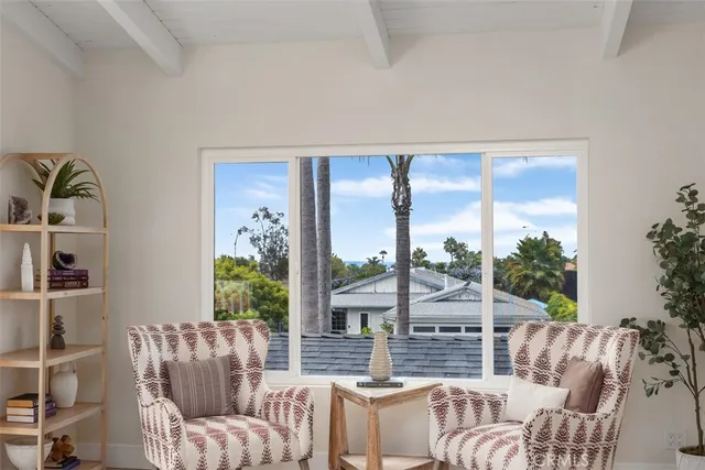 a bathroom with a sink double vanity mirror and a bathtub