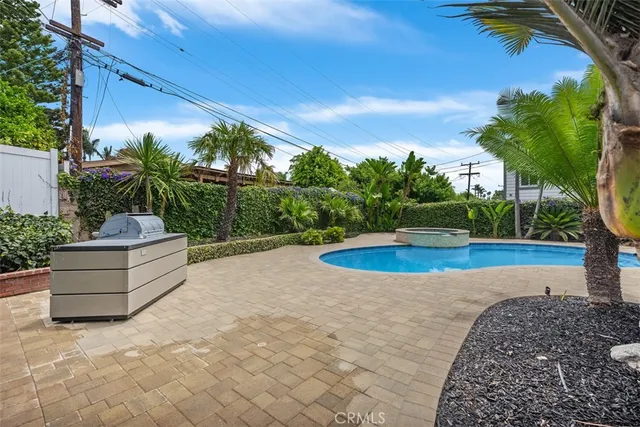 a view of a chair and table of the garden