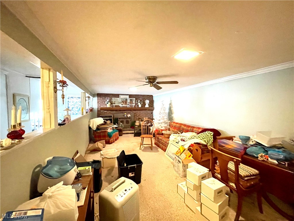 1834 Waterloo Road Mogadore, OH 44260 - Photo 22 of 26 Downstairs living room with woodburner