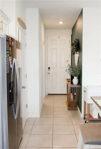 a view of a storage & utility room with a sink