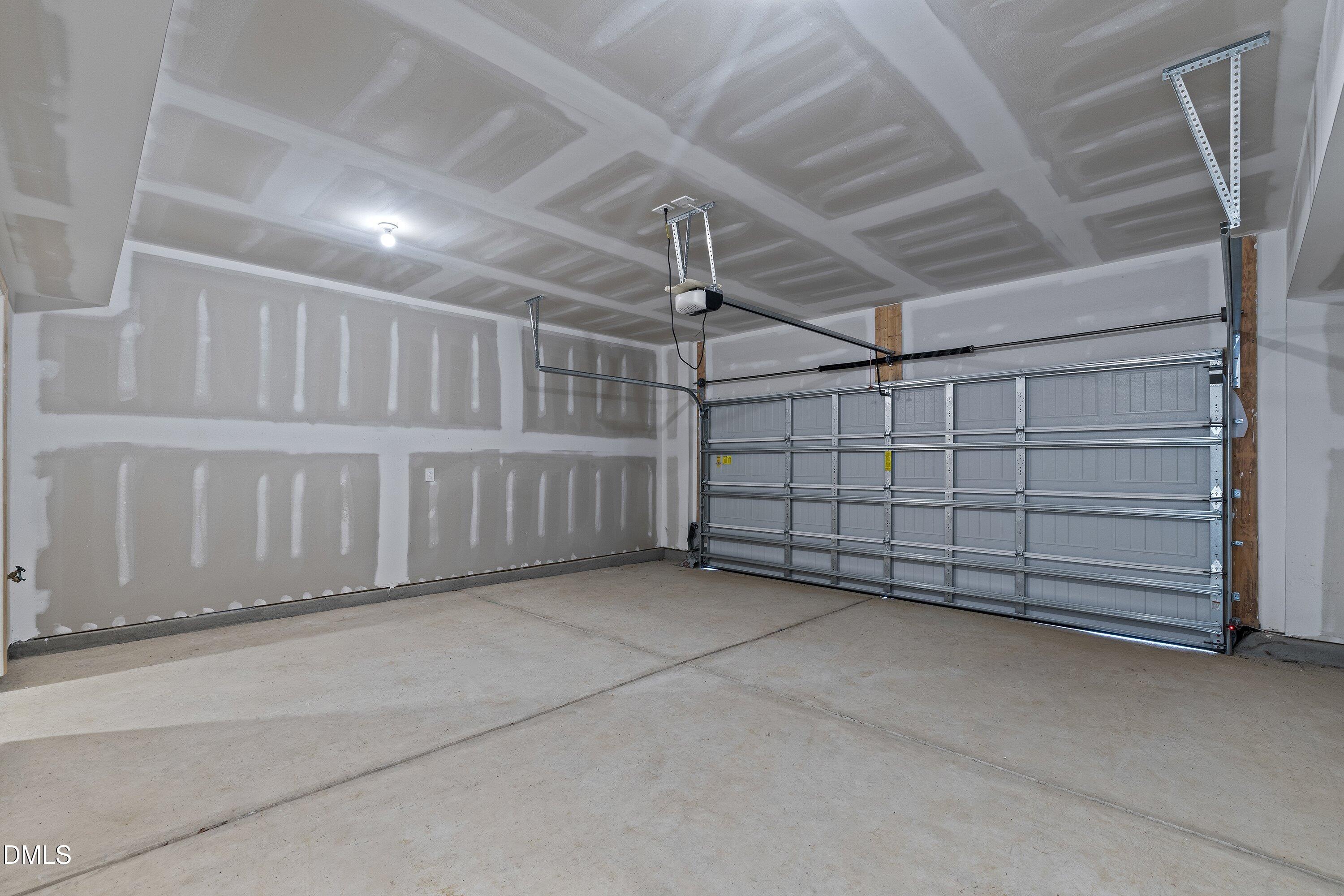 7242 Morris Acres Road Apex, NC 27523 - Photo 33 of 35 a view of a garage