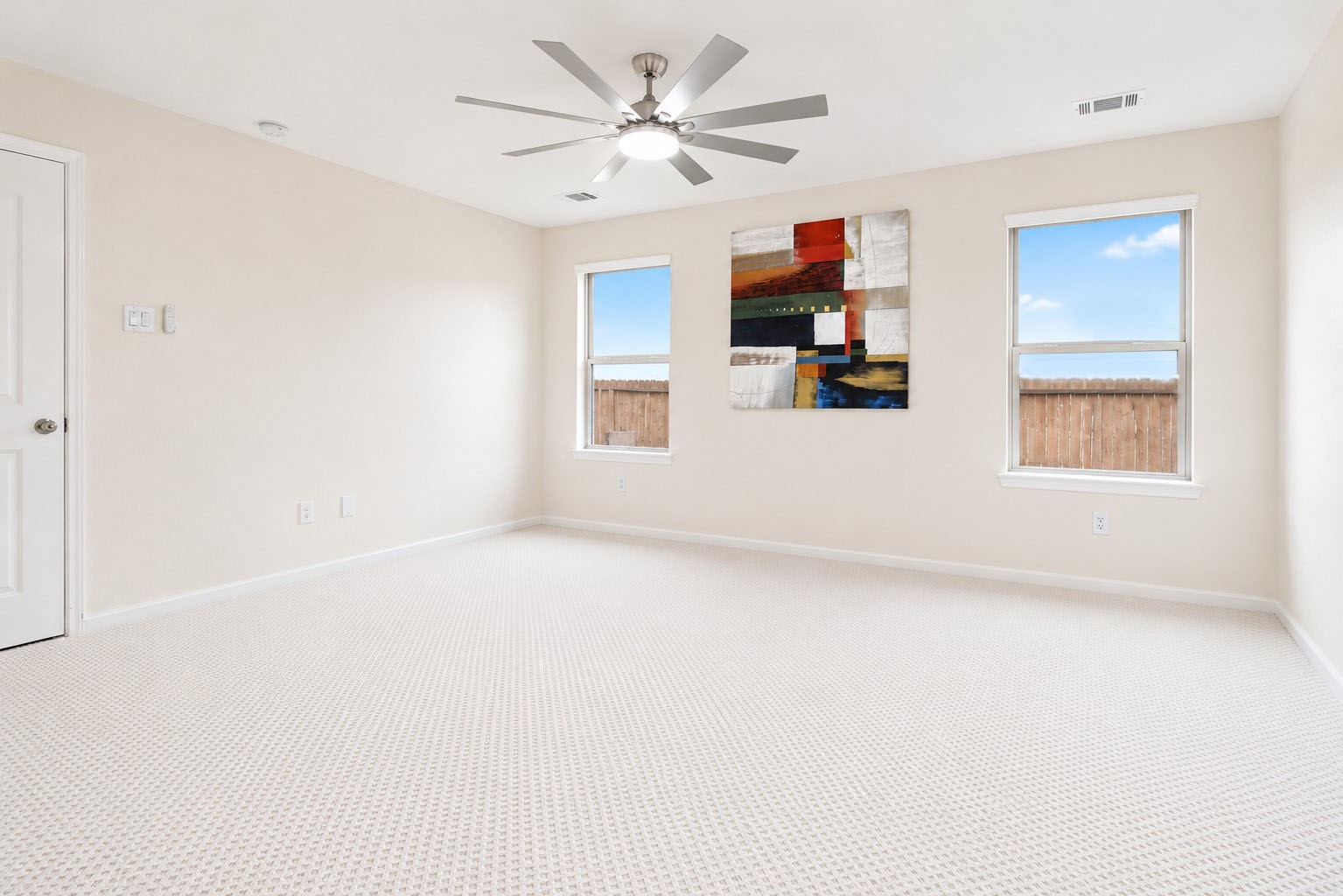5612 Rainflower Terrace Lane Spring, TX 77389 - Photo 20 of 50 an empty room with windows and cabinet
