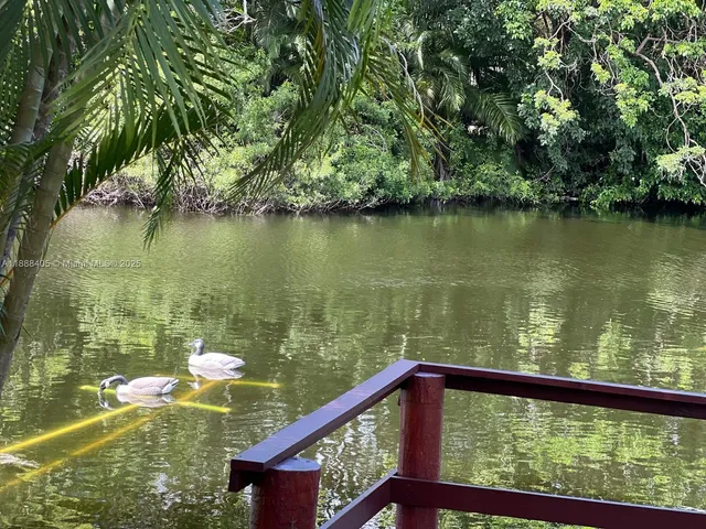 a view of a lake from a balcony