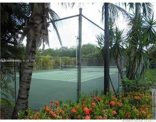 1021 Mockingbird Lane, Unit 209 Plantation, FL 33324 - Photo 25 of 26 a view of a backyard