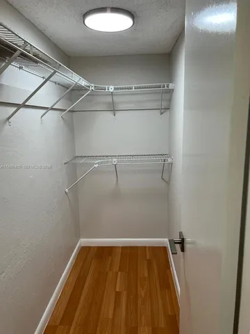 a view of a room with racks on the wall