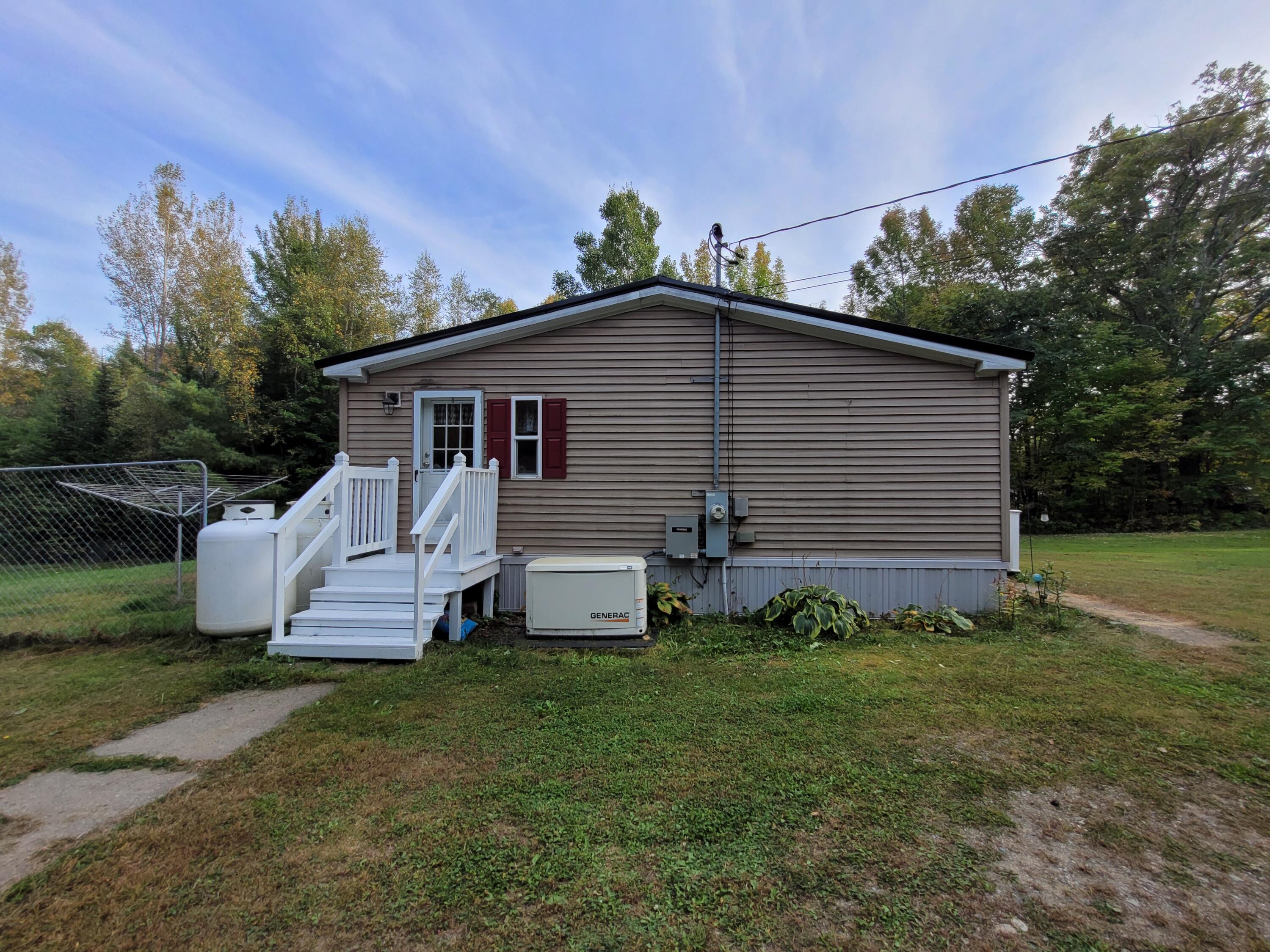 66 Berry Road Pittsfield, ME 04967 - Photo 27 of 30 27 Side view