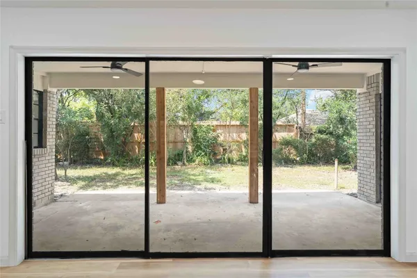 a view of a room with a large window