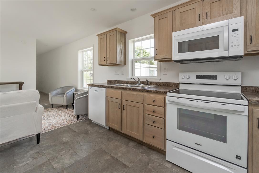 624 Main Road Lehighton, PA 18235 - Photo 20 of 42 A streamlined kitchen flows into the living area, creating an effortless layout for daily living and entertaining.