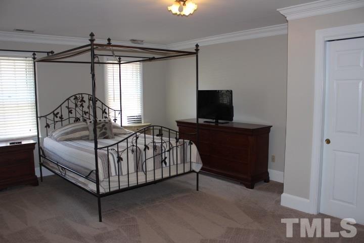 2205 Millpine Drive Raleigh, NC 27614 - Photo 12 of 22 19'x12' Master Bedroom with 1 walk-in closet and 1 large closet with sliding doors.