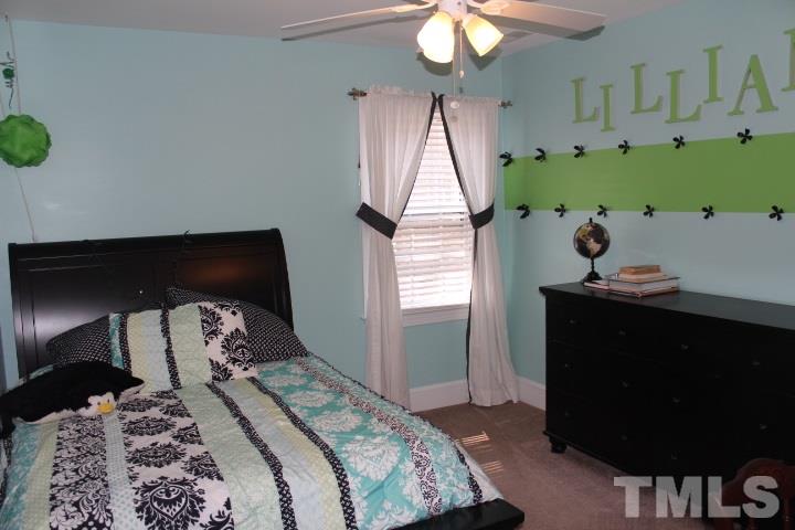 2205 Millpine Drive Raleigh, NC 27614 - Photo 14 of 22 12.7'x12' Bedroom 2 has a large walk-in closet.