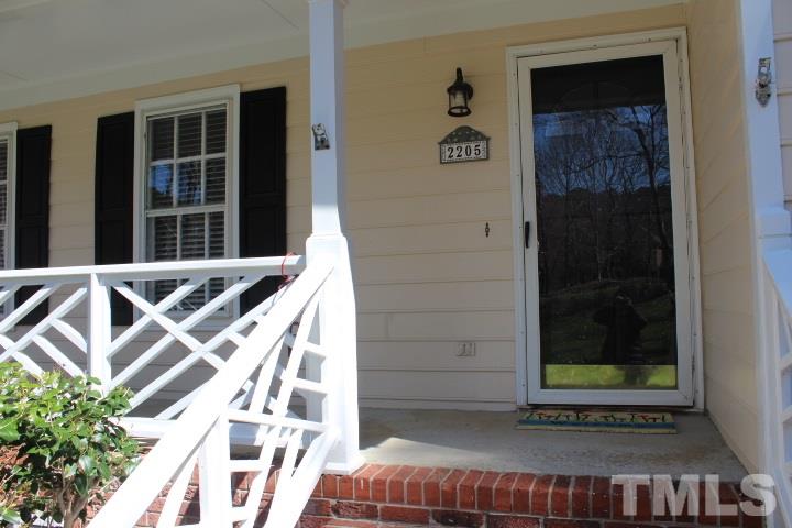 2205 Millpine Drive Raleigh, NC 27614 - Photo 3 of 22 Wood front door with storm door