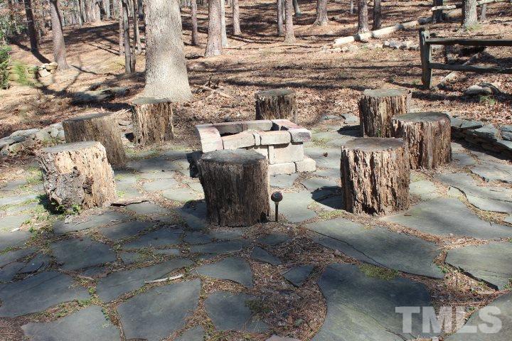 2205 Millpine Drive Raleigh, NC 27614 - Photo 21 of 22 A Fire Pit in backyard is great for enjoying the outdoor.
