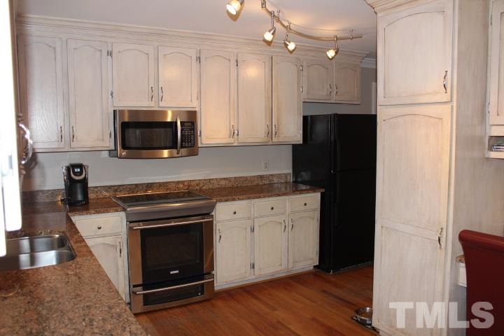 2205 Millpine Drive Raleigh, NC 27614 - Photo 9 of 22 Kitchen has updated stainless steel appliances.