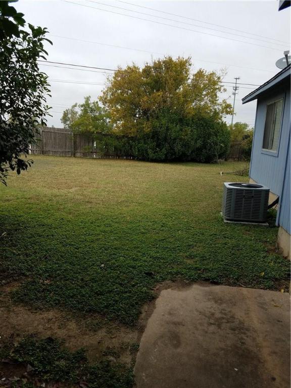 1304 Pitcairn Drive, Unit A Pflugerville, TX 78660 - Photo 8 of 10 a view of outdoor space and yard