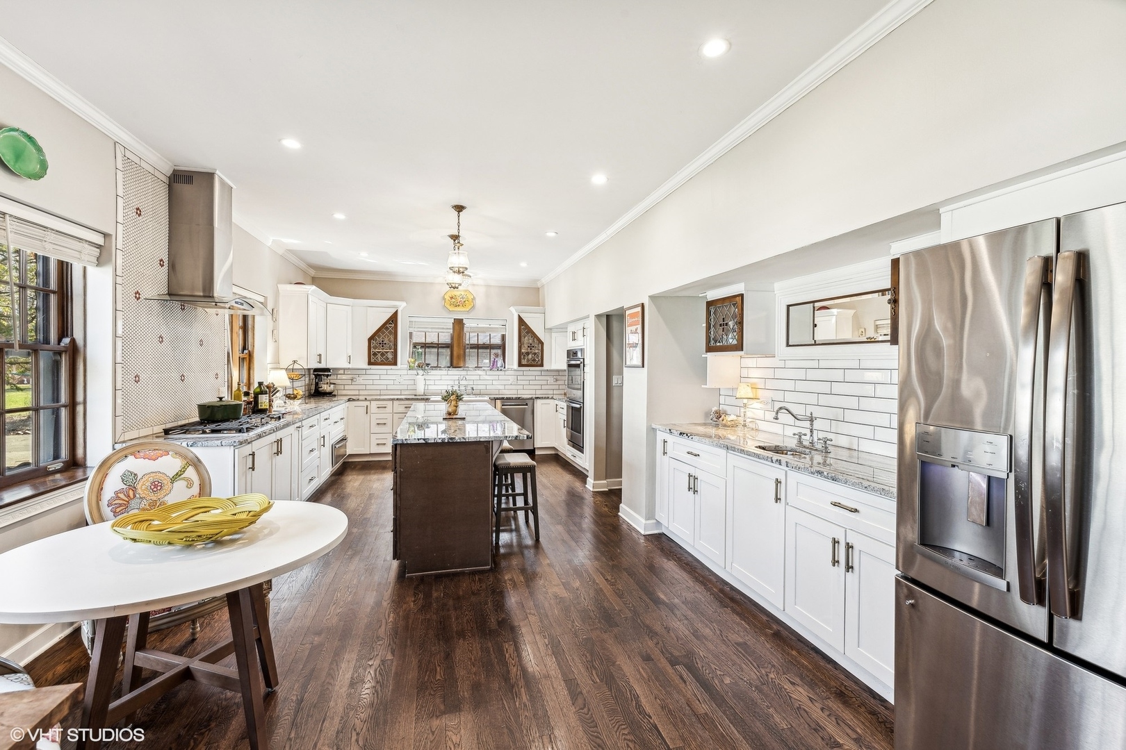273 Maplewood Road Riverside, IL 60546 - Photo 14 of 50 a large kitchen with stainless steel appliances lots of counter space and breakfast area