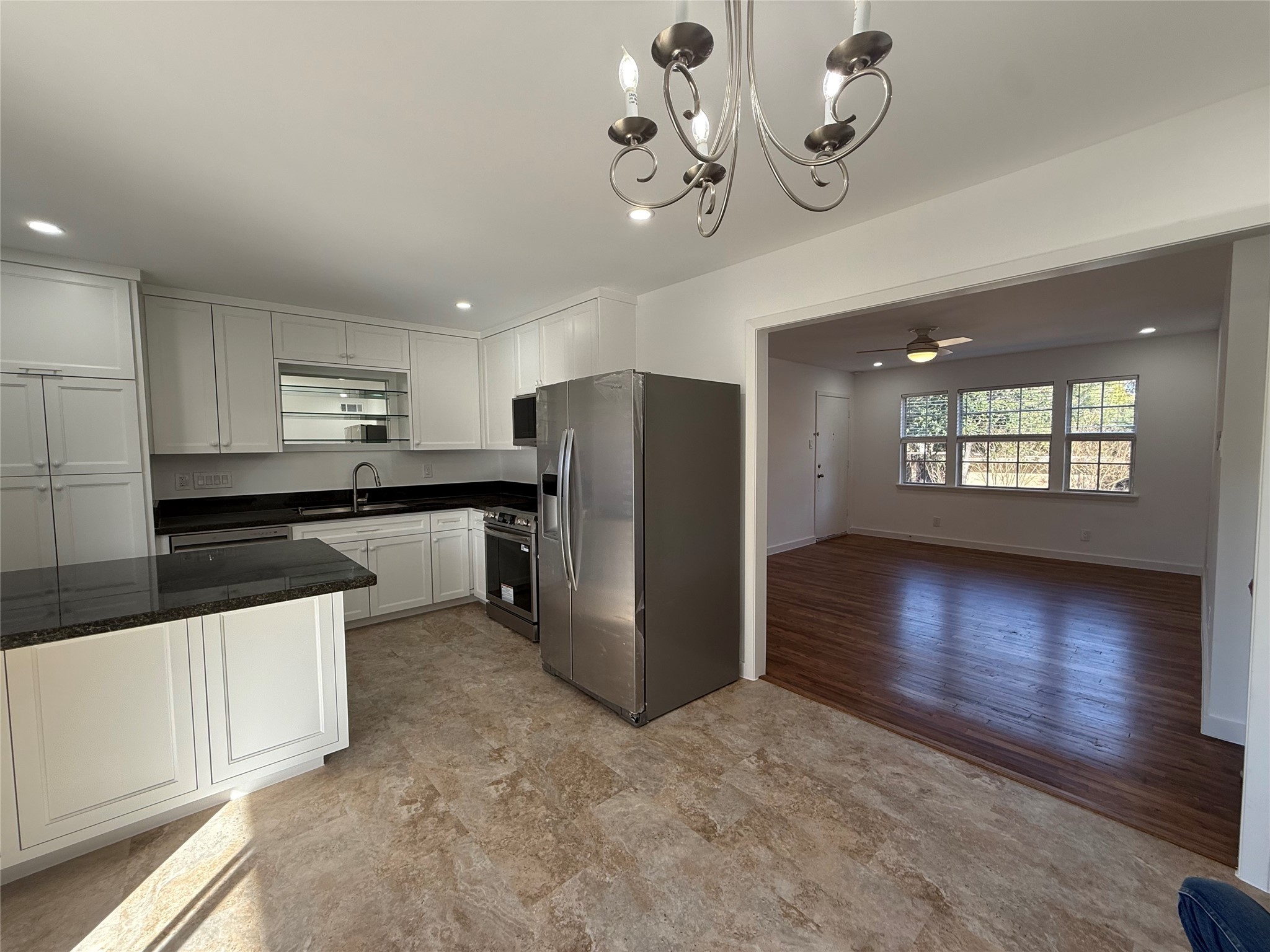 4040 San Felipe Street, Unit 247 Houston, TX 77027 - Photo 11 of 29 View of kitchen into living room