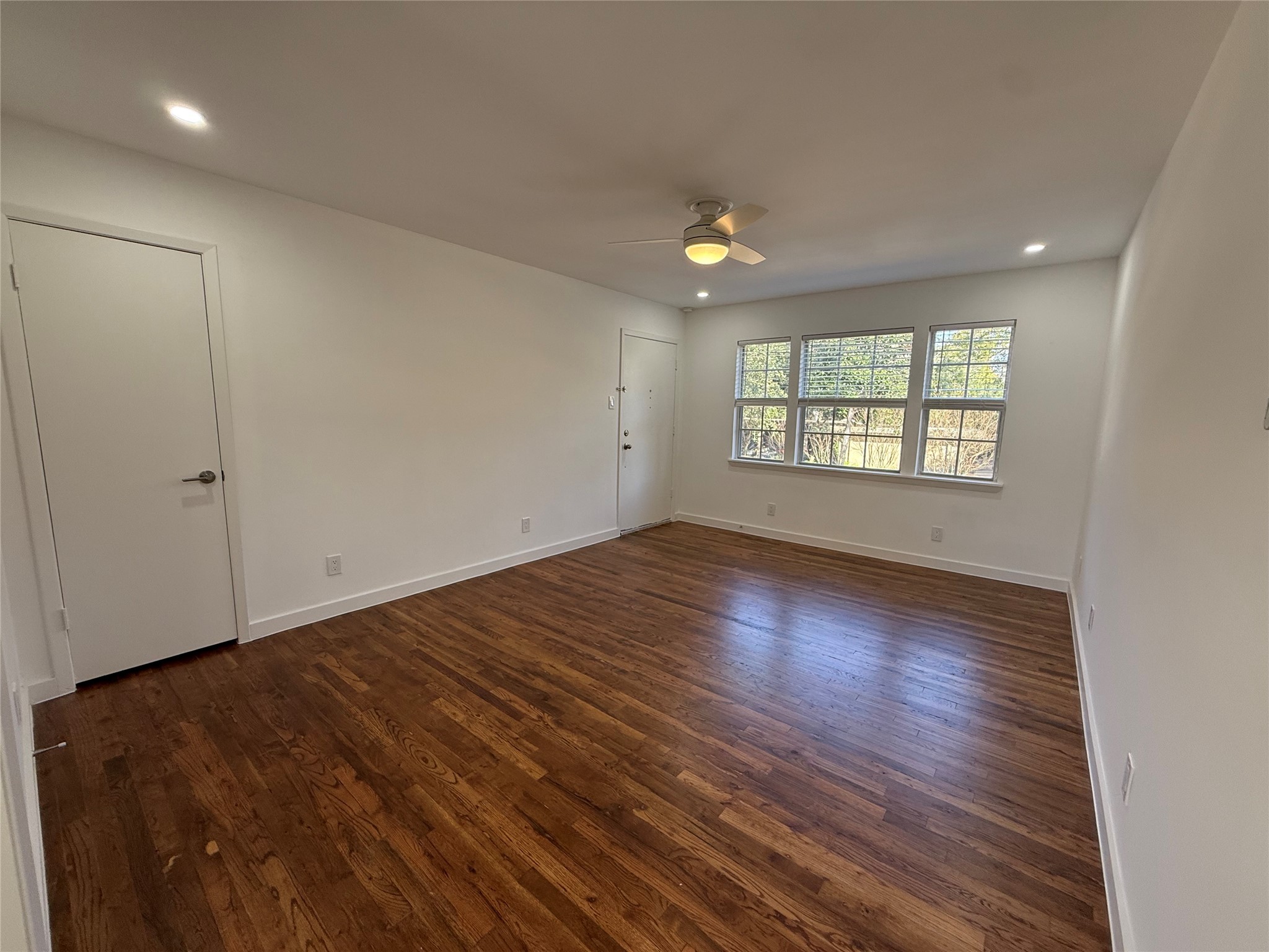 4040 San Felipe Street, Unit 247 Houston, TX 77027 - Photo 2 of 29 Living room with warm wood flooring