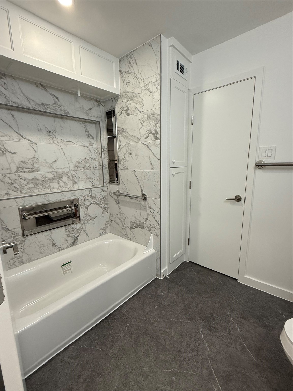 4040 San Felipe Street, Unit 247 Houston, TX 77027 - Photo 21 of 29 Lots of fun storage spaces added to the bathroom