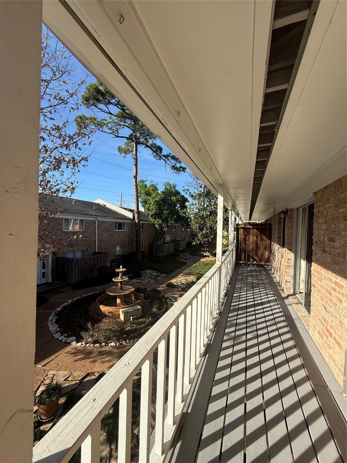 4040 San Felipe Street, Unit 247 Houston, TX 77027 - Photo 27 of 29 Balcony overlooks serene courtyard