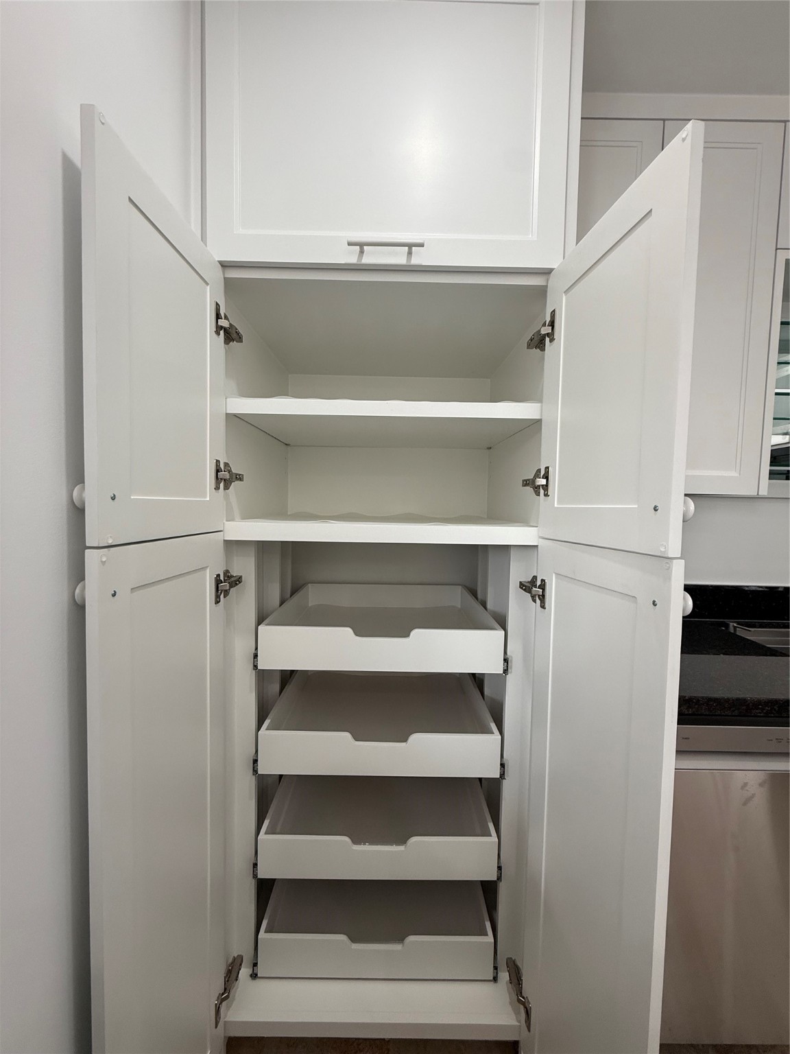 4040 San Felipe Street, Unit 247 Houston, TX 77027 - Photo 8 of 29 Pantry with custom cabinetry