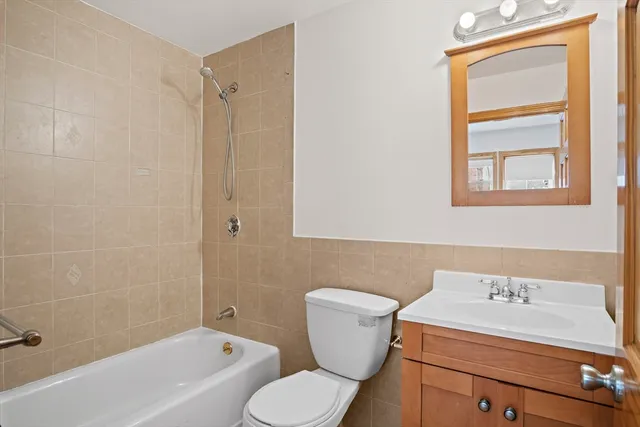 a kitchen with granite countertop cabinets stainless steel appliances and a sink