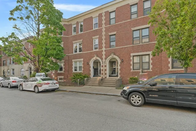 a car parked in front of a building