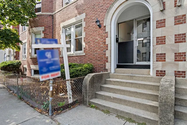 a car parked in front of a house
