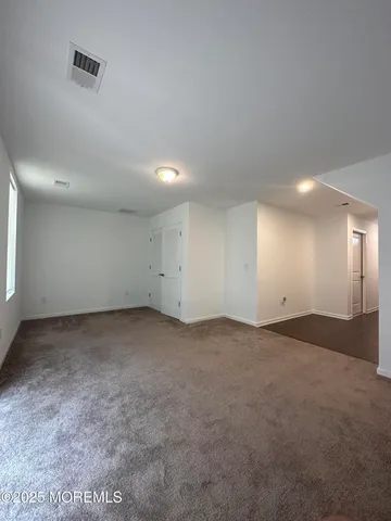 an empty room with window