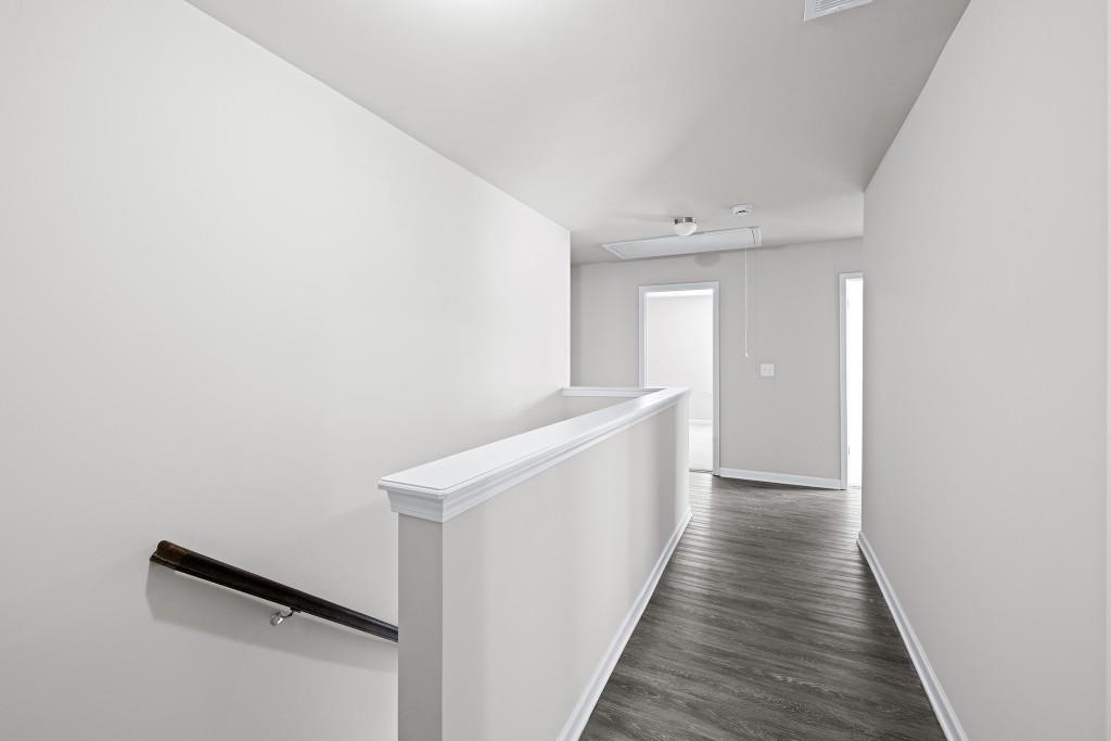 7 Purackal Lane Statham, GA 30666 - Photo 25 of 57 a view of a hallway with wooden floor