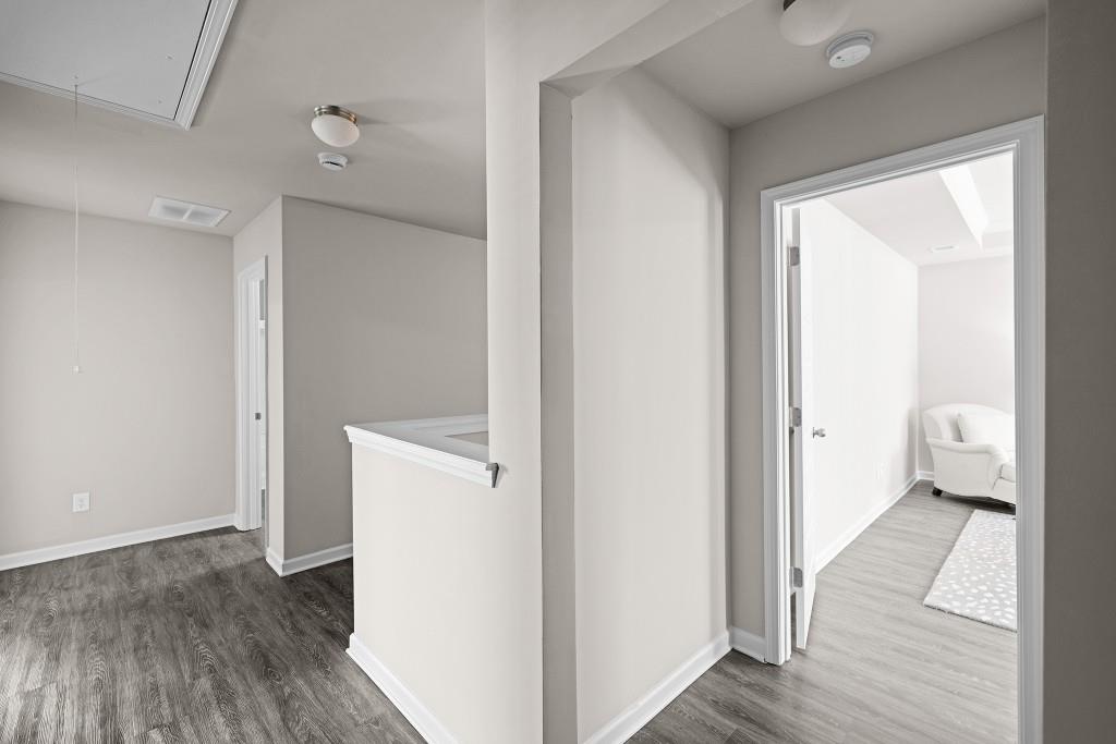 7 Purackal Lane Statham, GA 30666 - Photo 26 of 57 a view of a room with wooden floor and a bathroom