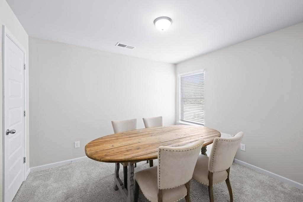 7 Purackal Lane Statham, GA 30666 - Photo 36 of 57 a view of a dining room with furniture