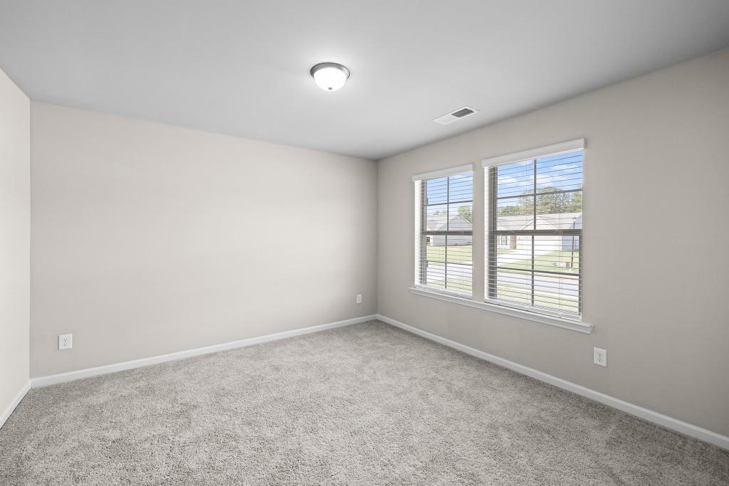 7 Purackal Lane Statham, GA 30666 - Photo 38 of 57 an empty room with a window